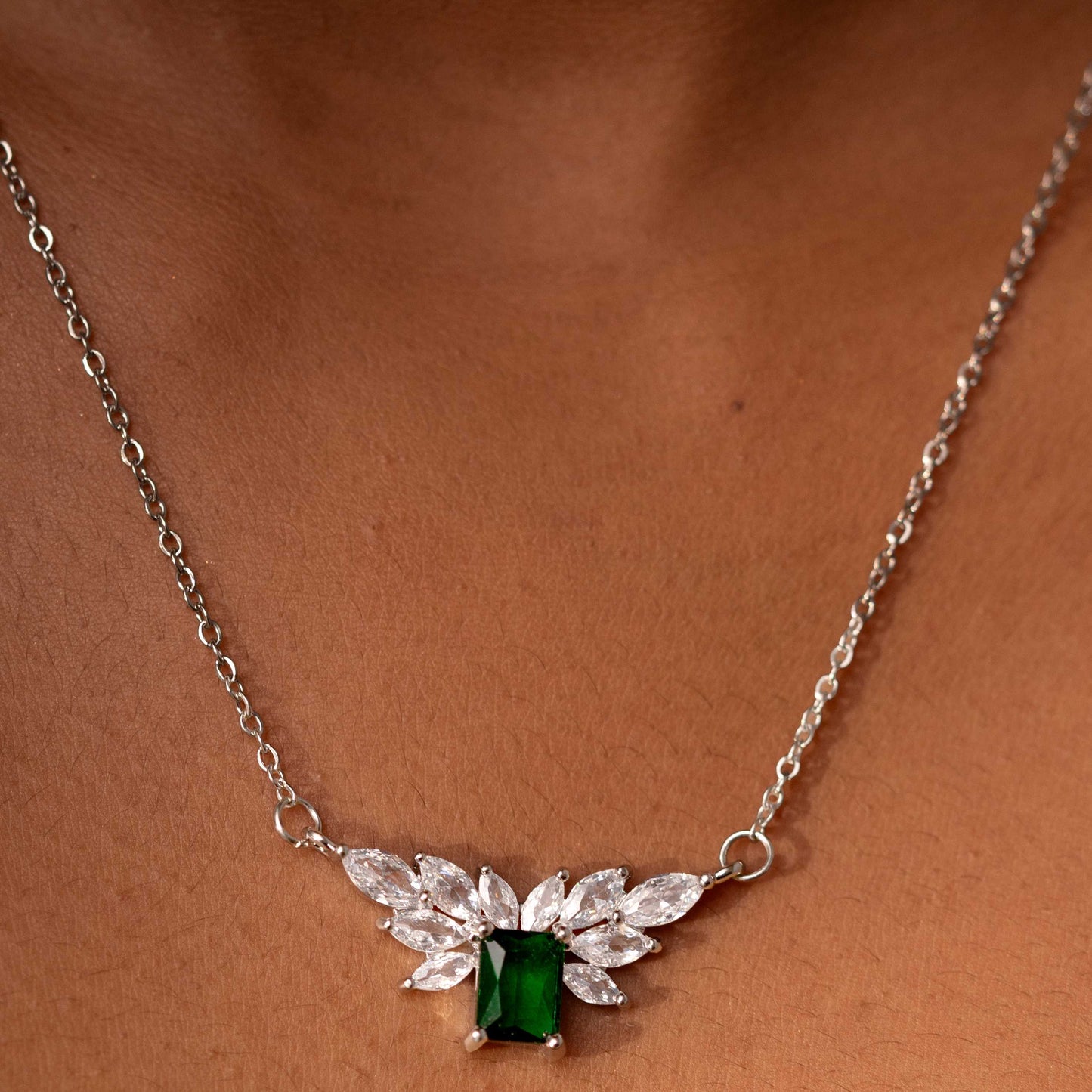 RHODIUM PLATED OVAL ZIRCON STUDDED WITH SQUARE EMERALD STONE - ALICIA