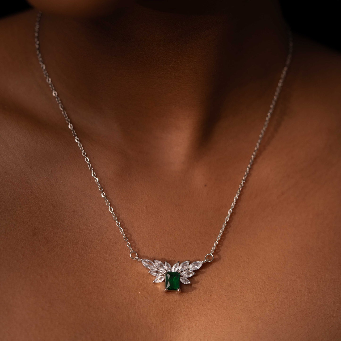 RHODIUM PLATED OVAL ZIRCON STUDDED WITH SQUARE EMERALD STONE - ALICIA