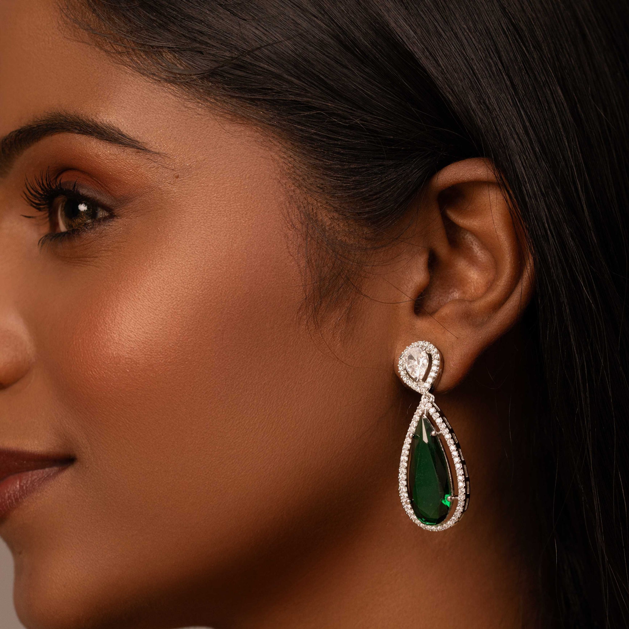 RHODIUM PLATED AMERICAN DIAMONDS WITH CUBIC ZIRCONIA AND EMERALD GREEN STONE - NOEL