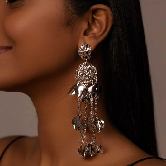 RHODIUM PLATED HAMMERED CIRCLE WITH HANGING PETALS - TARYN