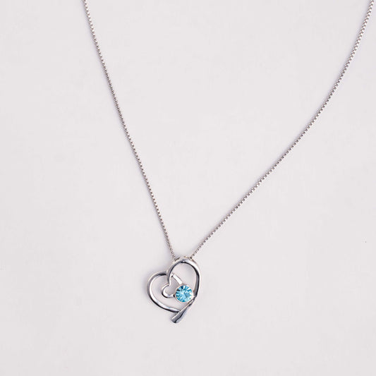 RHODIUM PLATED SIMPLE HEART WITH BLUE RHINESTONE - ENYA