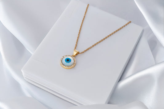 STUDDED EVIL EYE PENDANT